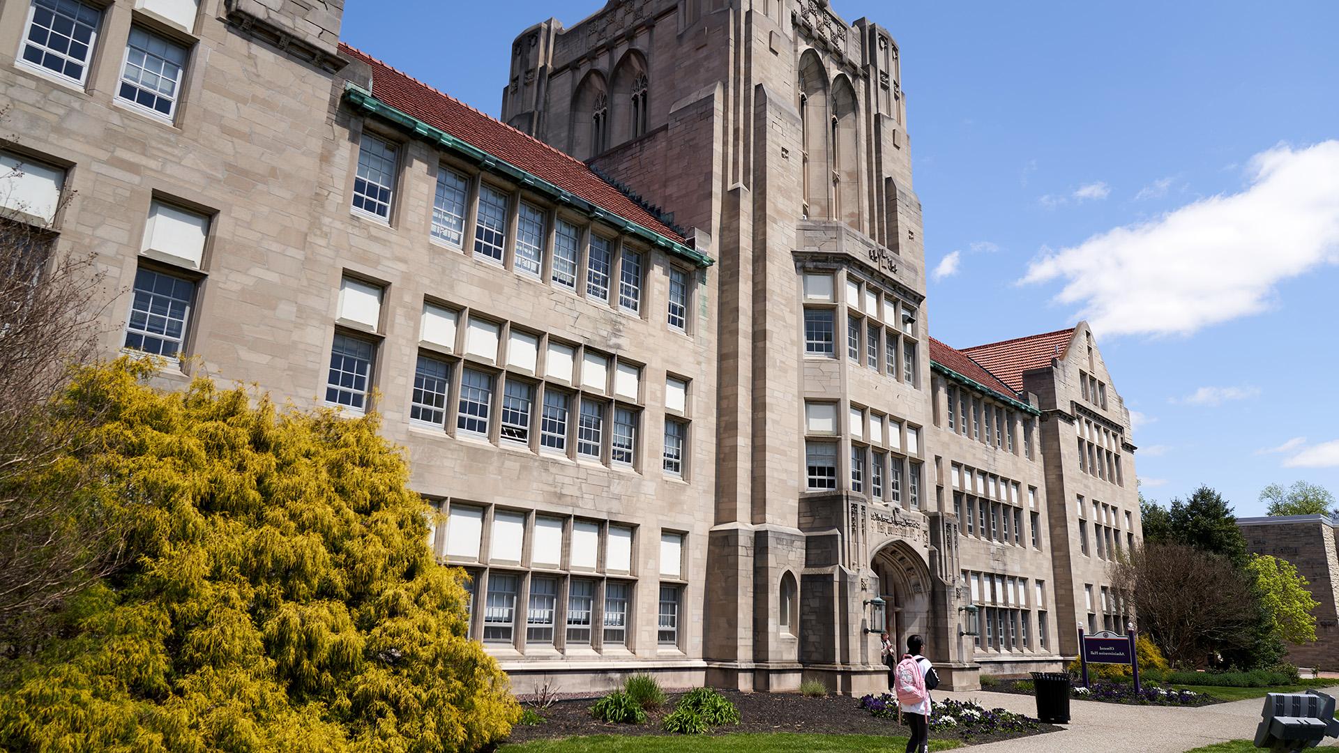 Olmsted Administration Hall up close with blue sky